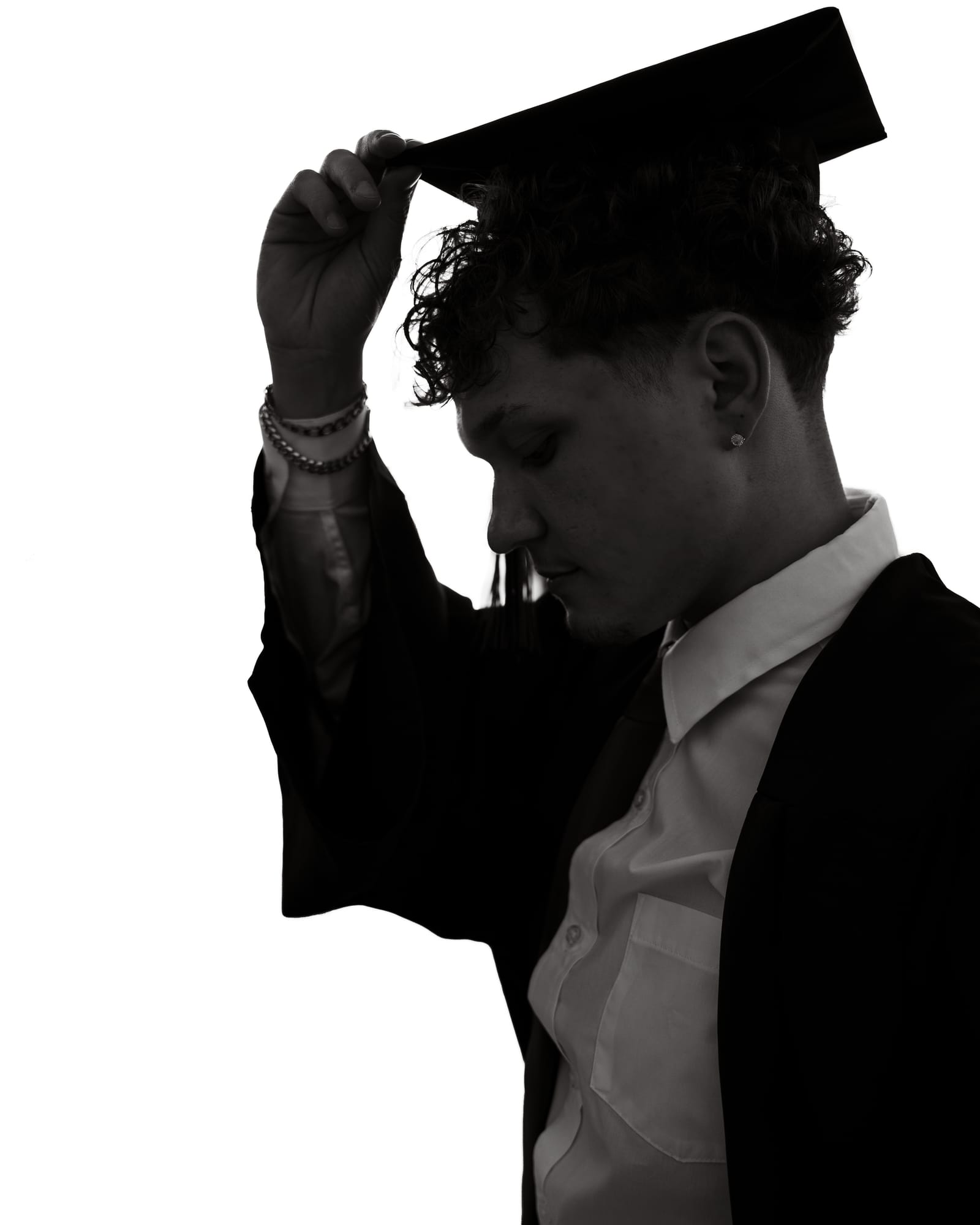 Black and white senior graduation portrait with dramatic side light, Phoenix, Arizona