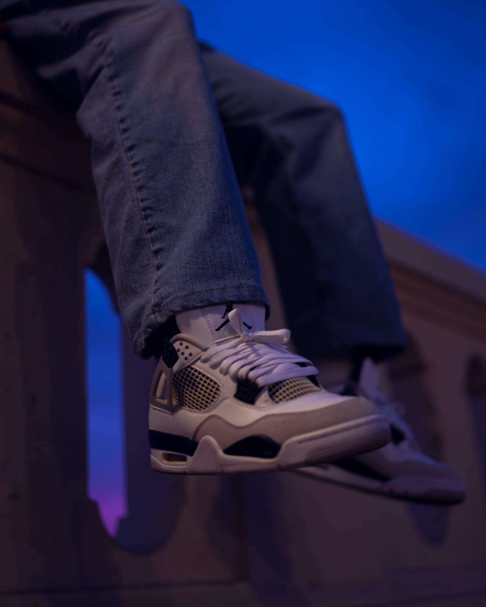 Senior graduation detail photo of Jordan sneakers in blue and purple evening light, Phoenix
